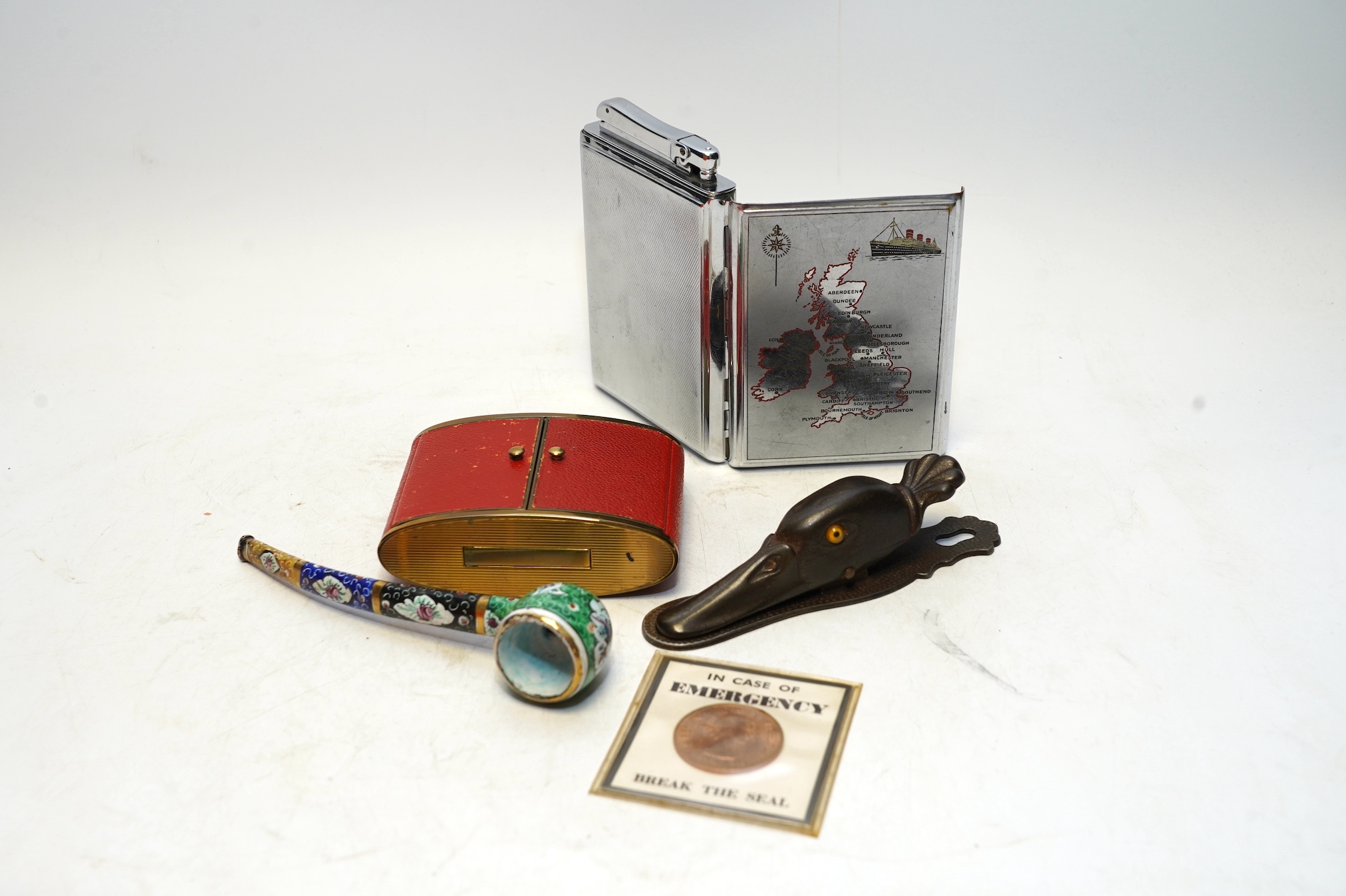 A quantity of empty jewellery boxes, a duck paper clip, a Festival of Britain commemorative coin, a cigarette case, etc. Condition - fair to good